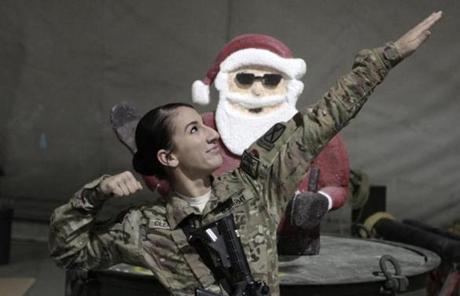 A US soldier with the NATO-led International Security Assistance Force posed at a Christmas ceremony in Logar province, eastern Afghanistan.
